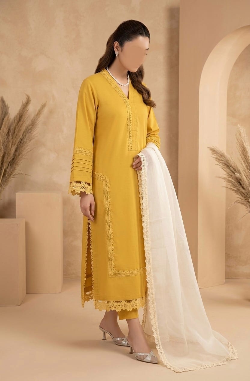 Woman in a yellow kurta with a white dupatta in a beige setting